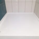 Душевой поддон из искусственного камня для ванной комнаты изготовлено в правила камня