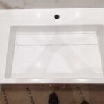 Псевдощелевая раковина в ванной комнате изготовлено в правила камня